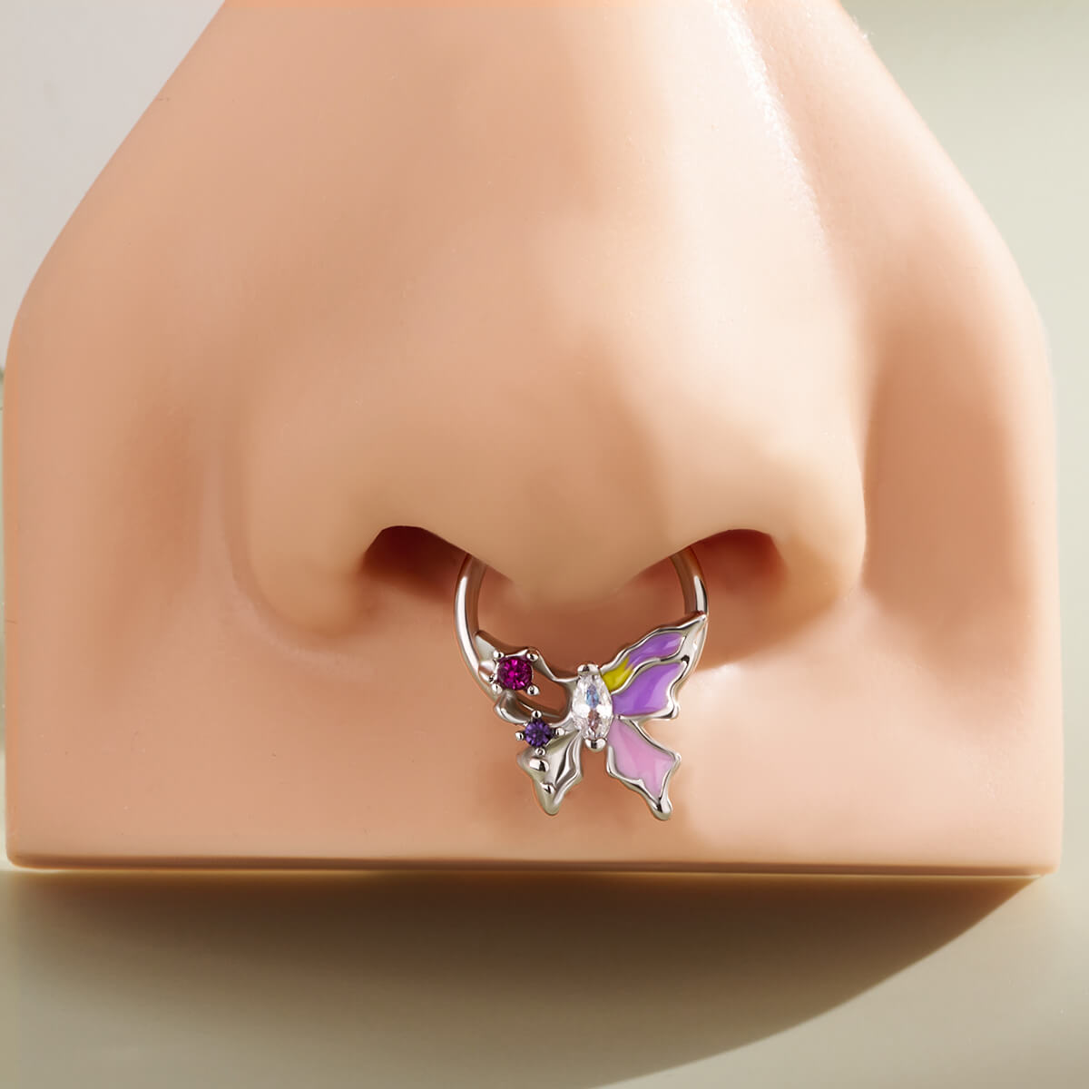 purple septum piercing