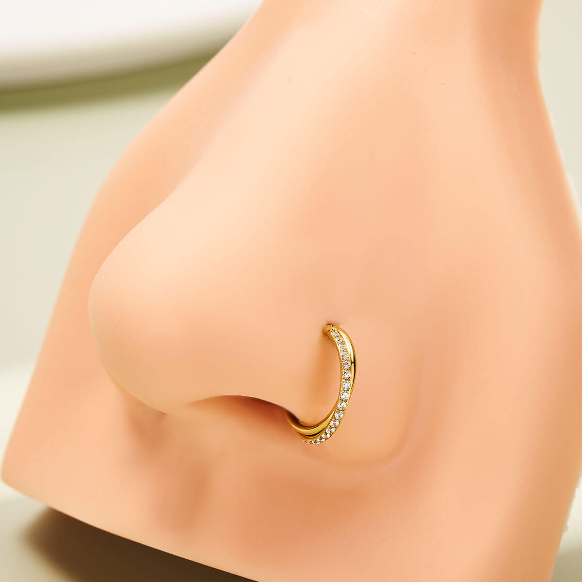 gold cute nose piercing