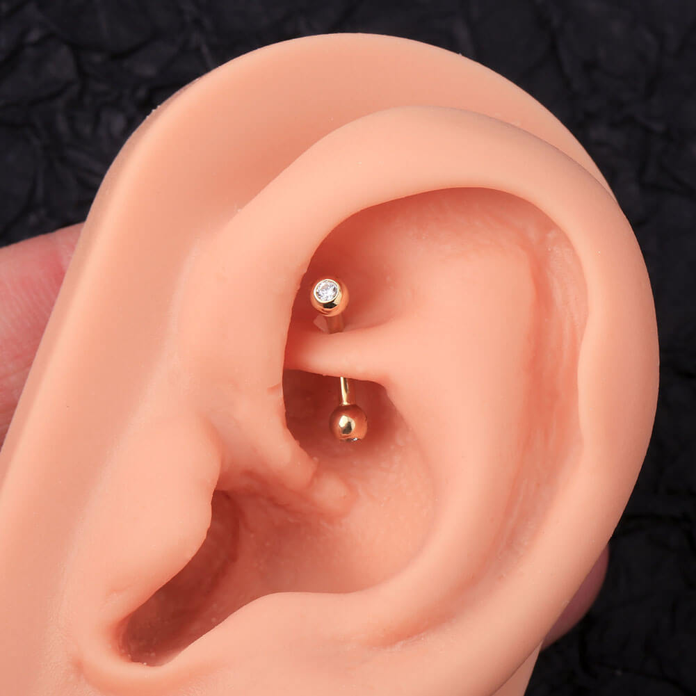 gold rook piercing