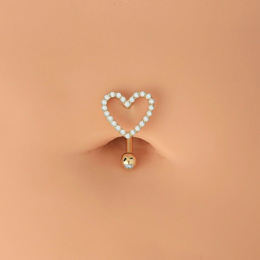 gold belly button piercing