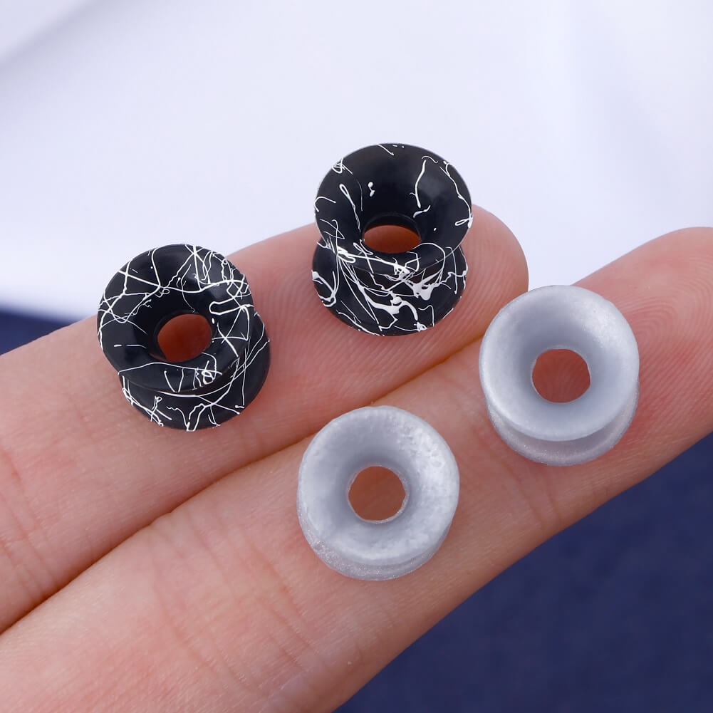 0g silver ear gauges